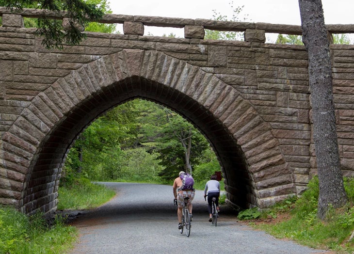bikers on the historic carriage roads today best hikes in acadia national park